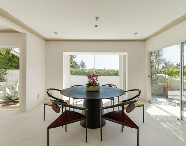 8706 Sunset Plaza Place - Photo Thumbnail 8