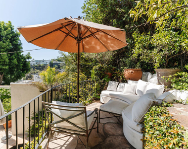 8706 Sunset Plaza Place - Photo Thumbnail 28