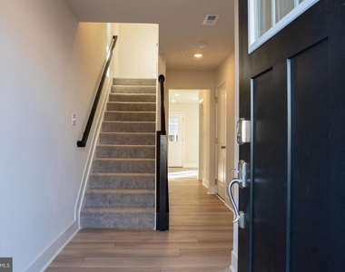 7606 River Reach Rd - Photo Thumbnail 1