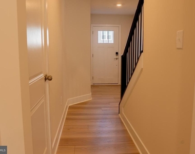 7606 River Reach Rd - Photo Thumbnail 2