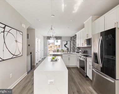 1341 Aspen Nw - Photo Thumbnail 3