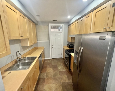 7722 S Cornell Avenue - Photo Thumbnail 2