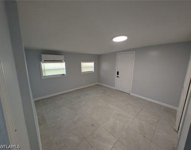111 Palmetto Lane W - Photo Thumbnail 5