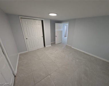111 Palmetto Lane W - Photo Thumbnail 8