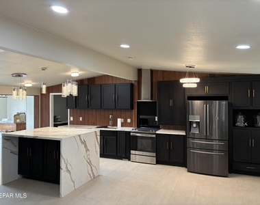 8316 W H Burges Drive - Photo Thumbnail 3