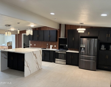 8316 W H Burges Drive - Photo Thumbnail 2