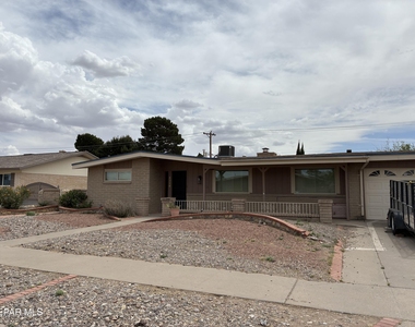 8316 W H Burges Drive - Photo Thumbnail 1