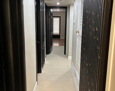 8316 W H Burges Drive - Photo Thumbnail 14