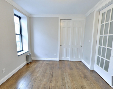 East 100th Street - Photo Thumbnail 1