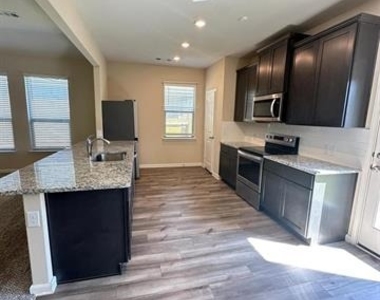 1707 Cotton Blossom Lane - Photo Thumbnail 3