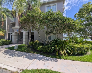 5001 Wiles Road - Photo Thumbnail 1