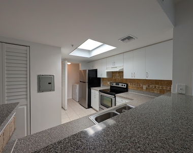 5001 Wiles Road - Photo Thumbnail 13