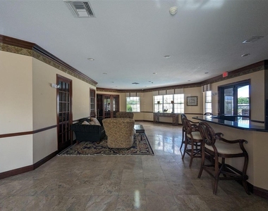 5001 Wiles Road - Photo Thumbnail 18