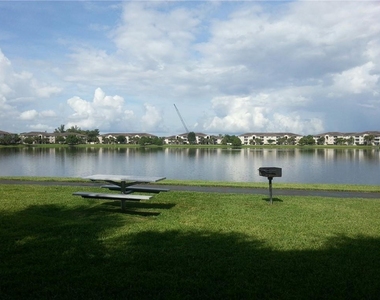 5001 Wiles Road - Photo Thumbnail 14