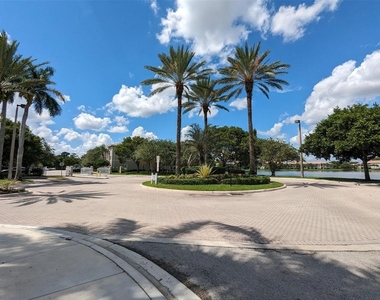 5001 Wiles Road - Photo Thumbnail 16