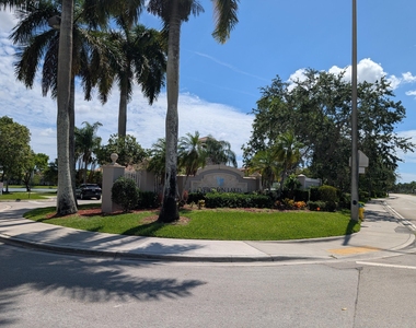 5001 Wiles Road - Photo Thumbnail 9