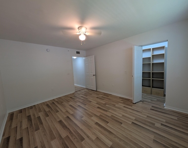 5001 Wiles Road - Photo Thumbnail 2