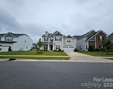 9578 Kartey Avenue Nw - Photo Thumbnail 1