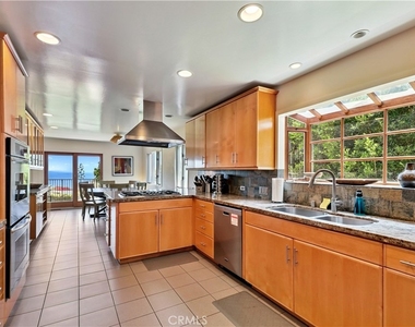 7161 Grasswood Avenue - Photo Thumbnail 13