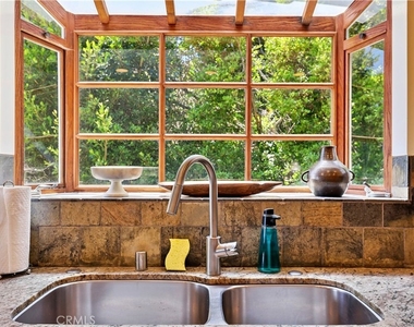 7161 Grasswood Avenue - Photo Thumbnail 15