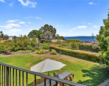 7161 Grasswood Avenue - Photo Thumbnail 1