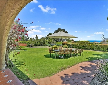 7161 Grasswood Avenue - Photo Thumbnail 3