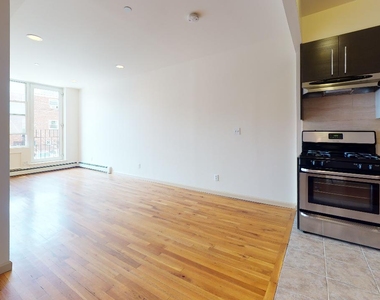 67-13 Austin Street - Photo Thumbnail 2