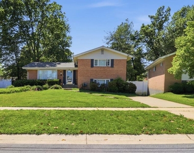 9912 Pomona Drive - Photo Thumbnail 1
