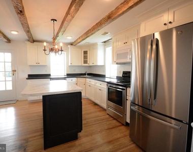 12108 Auburn Road - Photo Thumbnail 2