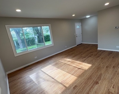975 N York Street - Photo Thumbnail 2
