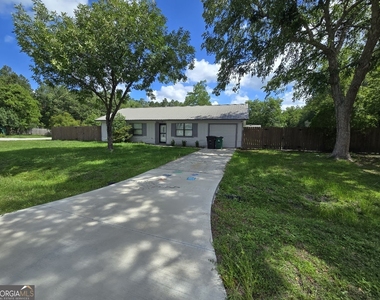 1001 Regal Road - Photo Thumbnail 1