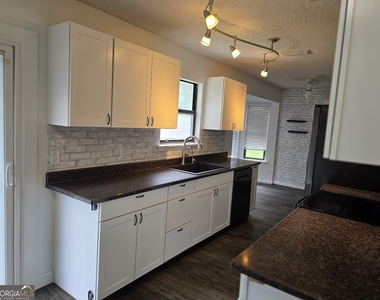 1001 Regal Road - Photo Thumbnail 15