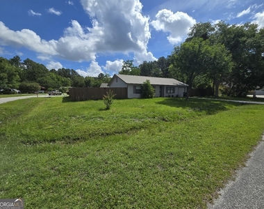 1001 Regal Road - Photo Thumbnail 3