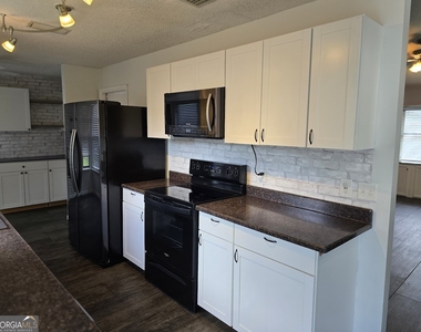 1001 Regal Road - Photo Thumbnail 16