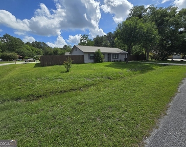 1001 Regal Road - Photo Thumbnail 4