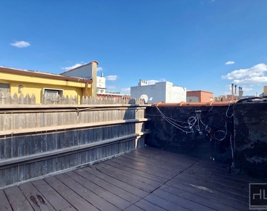 E 13th St. - Photo Thumbnail 8
