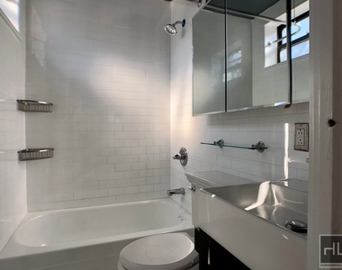 E 13th St. - Photo Thumbnail 7