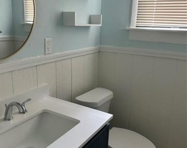 5611 Tremont Street - Photo Thumbnail 3