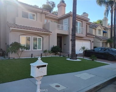 5711 Aura Ave - Photo Thumbnail 1