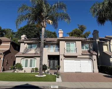 5711 Aura Ave - Photo Thumbnail 2