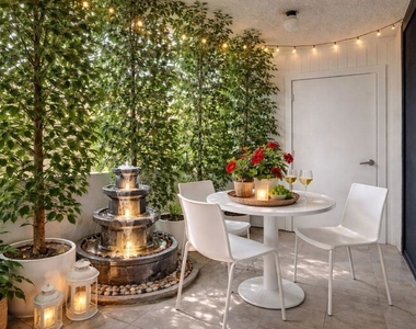 150 N Almont Drive - Photo Thumbnail 5