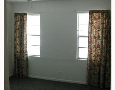 5512 Evans Ave - Photo Thumbnail 2