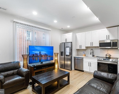 1307 Longfellow Street Nw - Photo Thumbnail 3