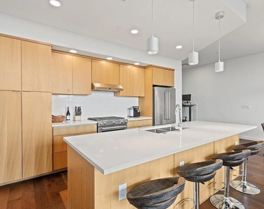 1322 E 12th St - Photo Thumbnail 5