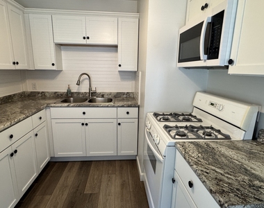 1508 W 36th Street - Photo Thumbnail 4