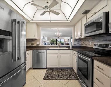 7430 Lake Breeze Drive - Photo Thumbnail 3