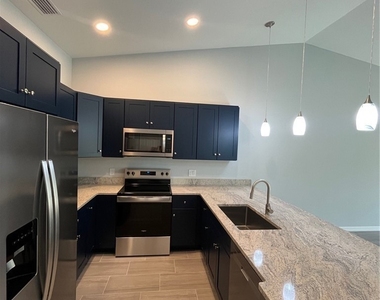 5653 Genesee Parkway - Photo Thumbnail 1