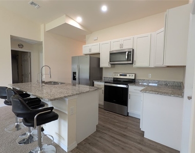 9001 Penny Cir Circle - Photo Thumbnail 2