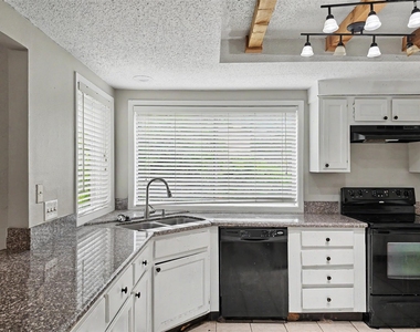7410 Songwind Lane - Photo Thumbnail 6