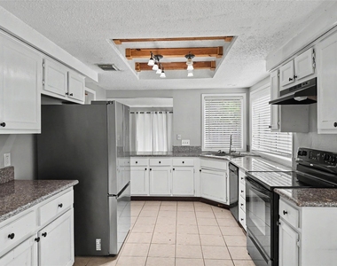 7410 Songwind Lane - Photo Thumbnail 7